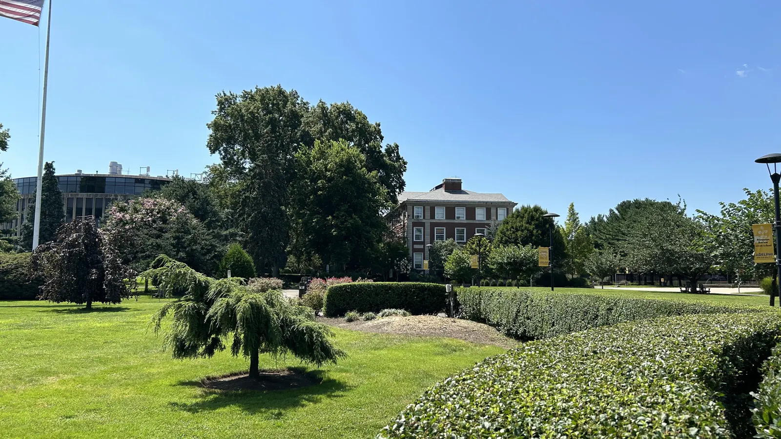 The quad at Adelphi University in Garden City, New York, with the Science Building and Blodgett Hall behind the lawns