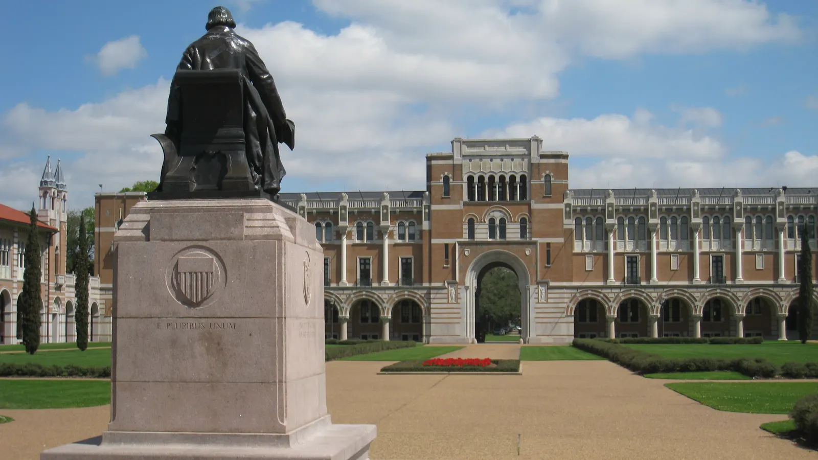 Lovett Hall behind the statue of William Marsh Rice on the academic quad at Rice University in Houston, Texas
