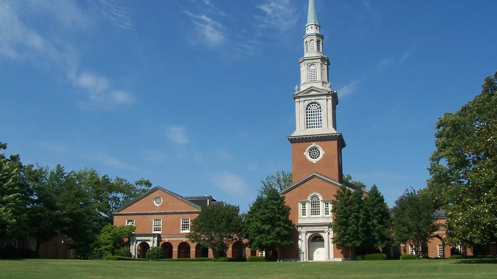 Reid Chapel and its white steeple beside a green lawn at Samford University in Birmingham, Alabama
