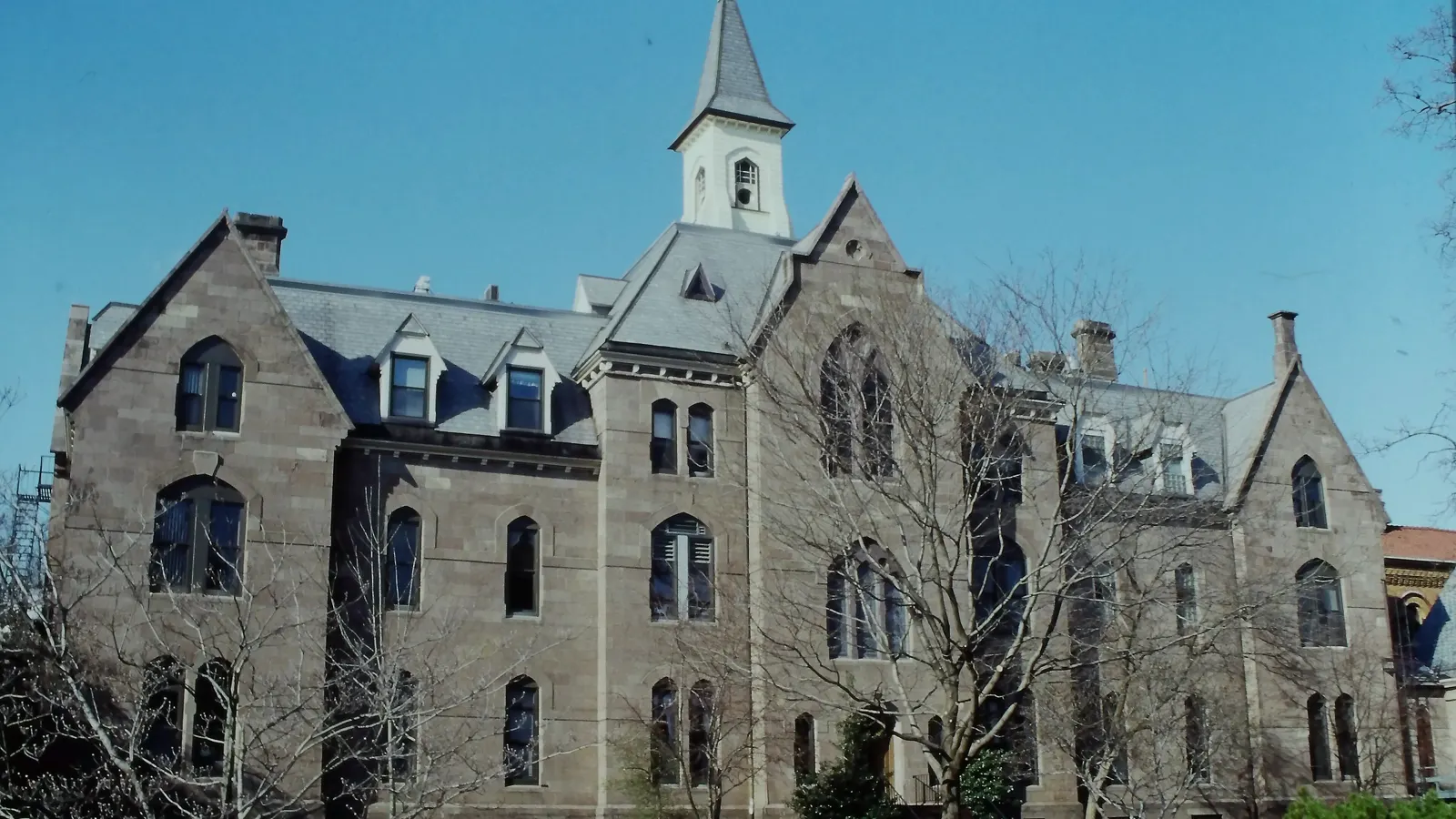 Presidents Hall, a Victorian Gothic stone building with a bell tower, on the Seton Hall University campus in South Orange, New Jersey