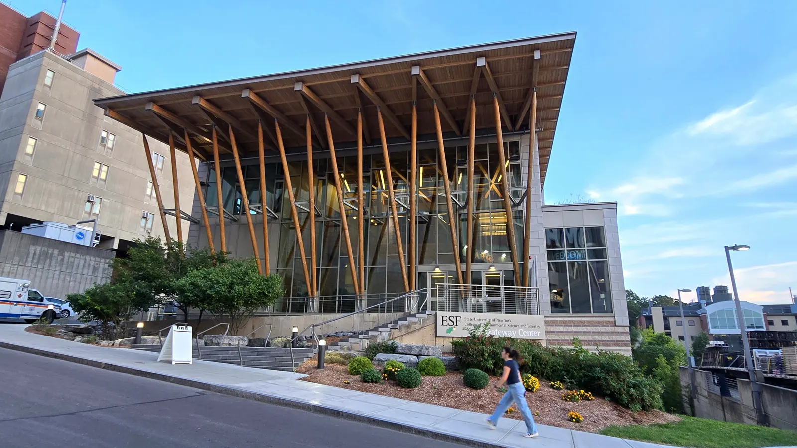 The Gateway Center, with its tall timber columns and glass front, on the SUNY College of Environmental Science and Forestry campus in Syracuse, New York