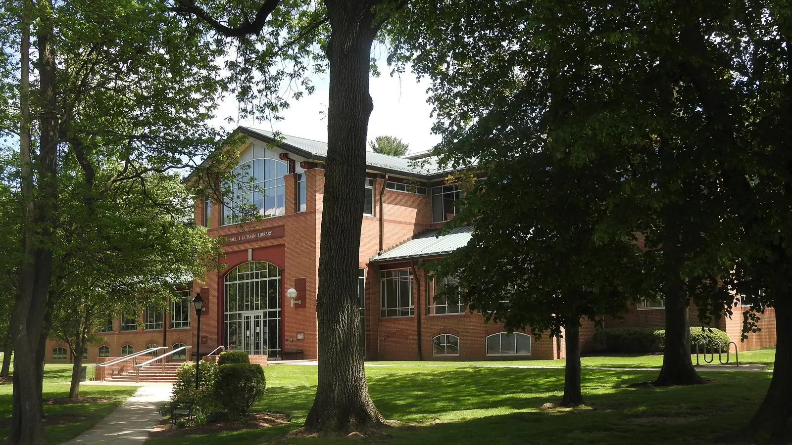 The Paul J. Gutman Library among shade trees on the East Falls campus of Thomas Jefferson University in Philadelphia