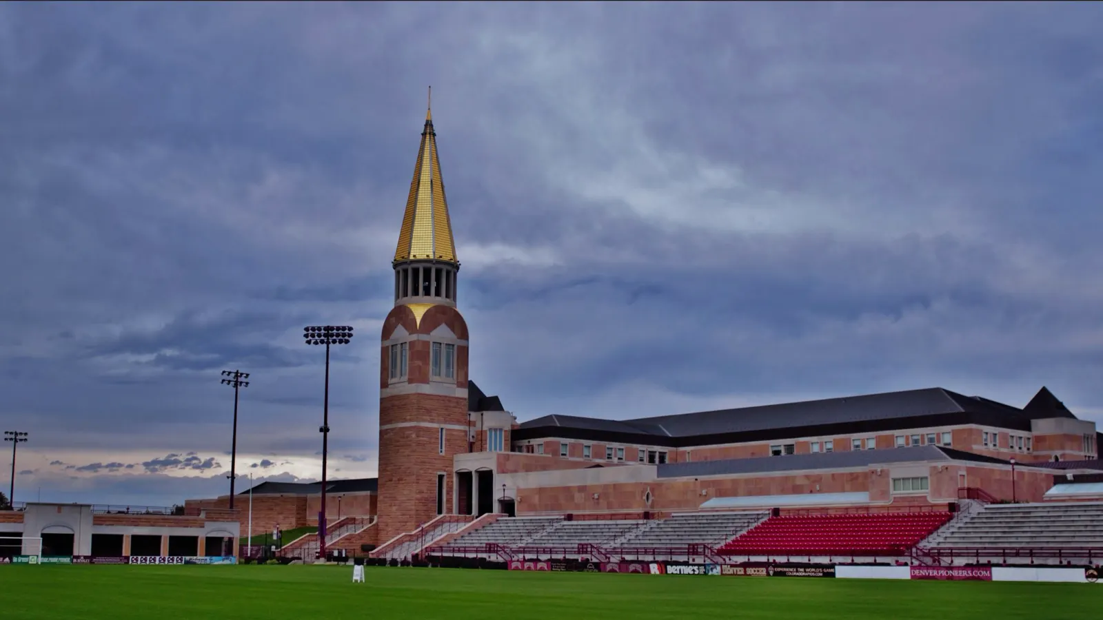 The Ritchie Center bell tower and the soccer stadium at the University of Denver in Denver, Colorado