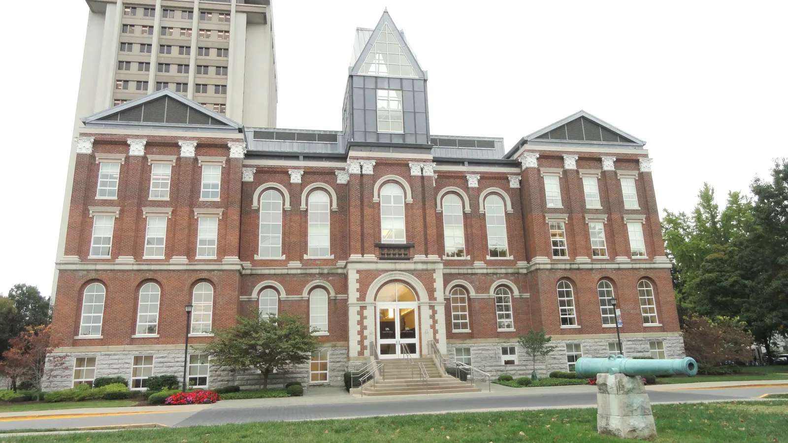 The brick Main Building with its central tower and lawn at the University of Kentucky in Lexington, Kentucky