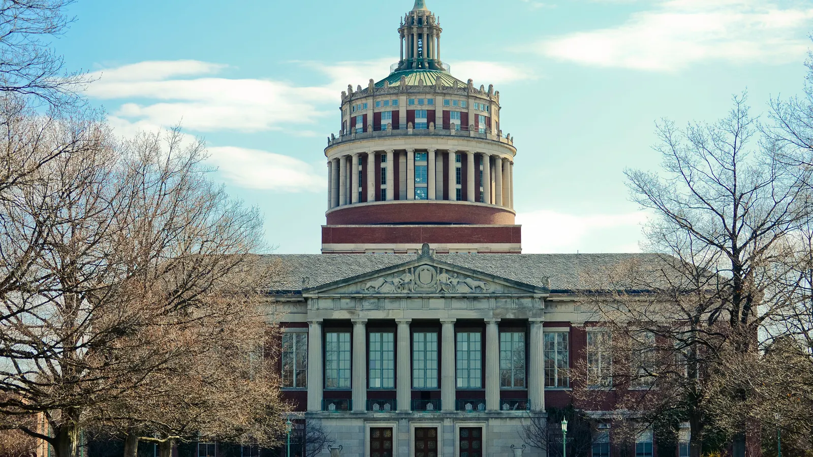 Rush Rhees Library and its dome seen across the quad at the University of Rochester in Rochester, New York