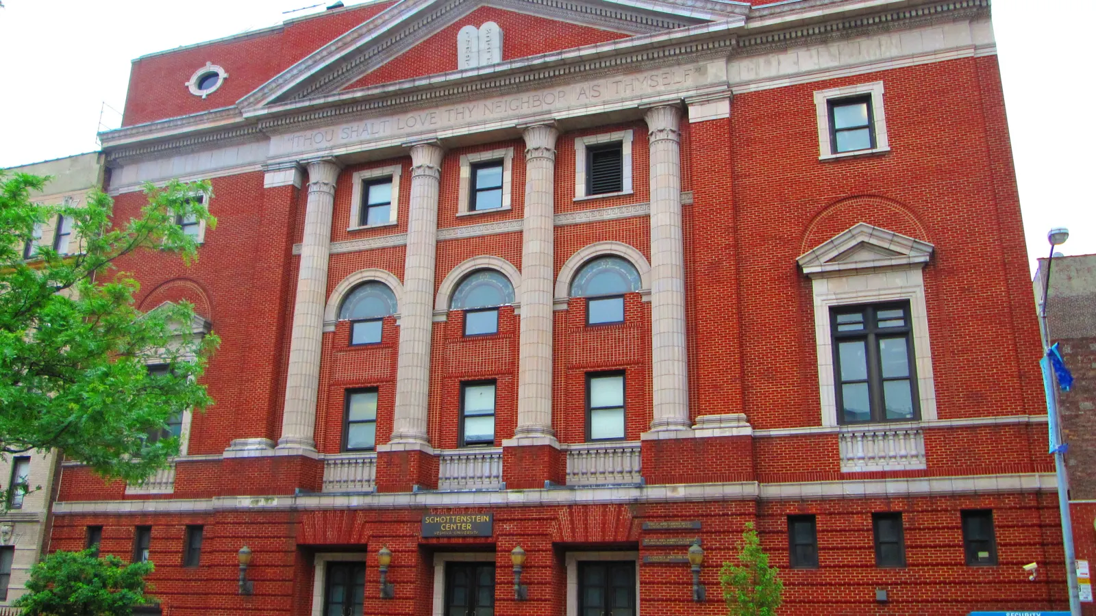 The red brick Schottenstein Center, with its columned facade, at Yeshiva University in Washington Heights, New York City